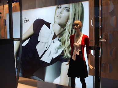 Fabric faced light box in a store front