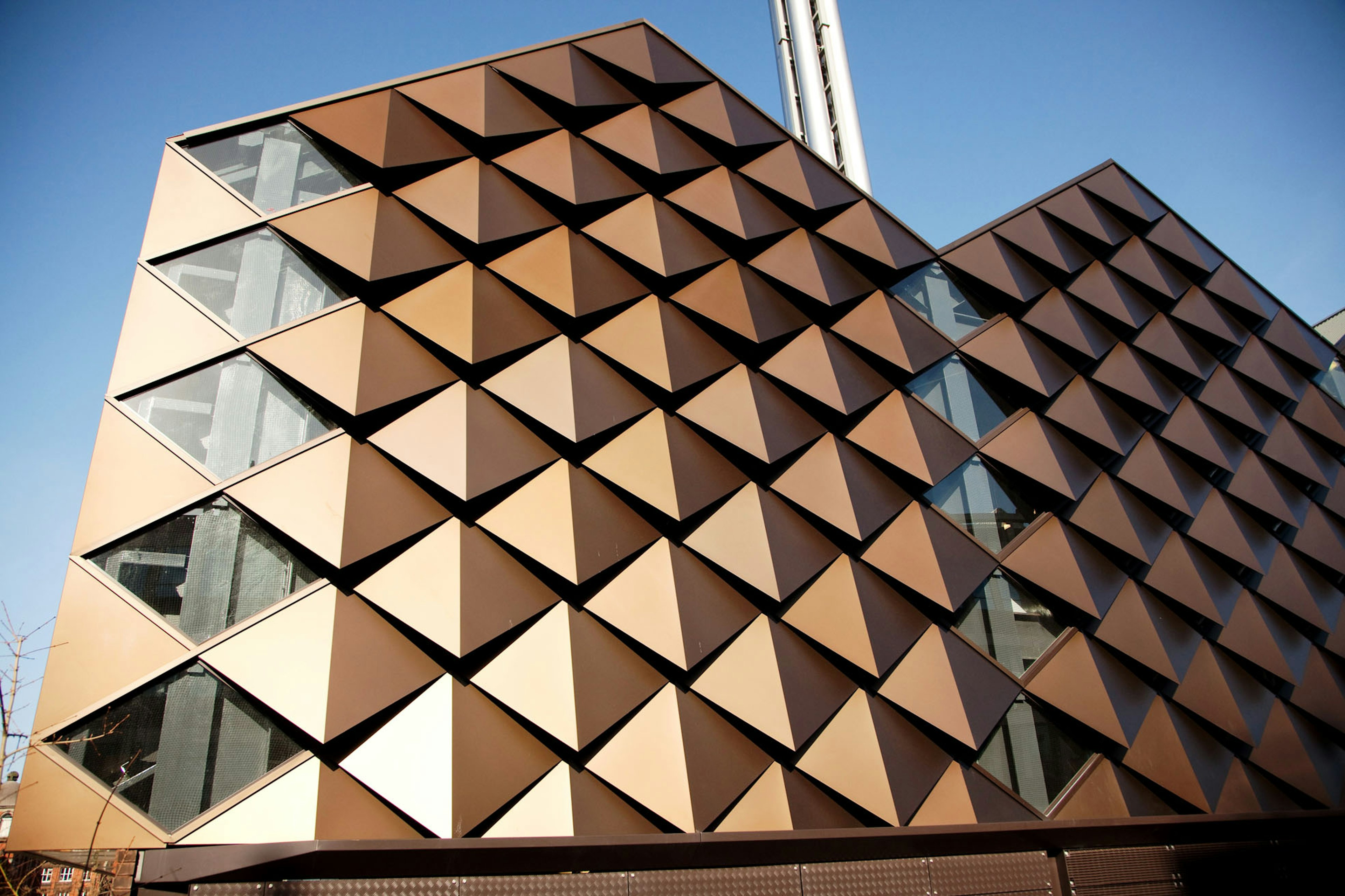 Get in touch with NES today to explore how our cladding solutions can transform your environment